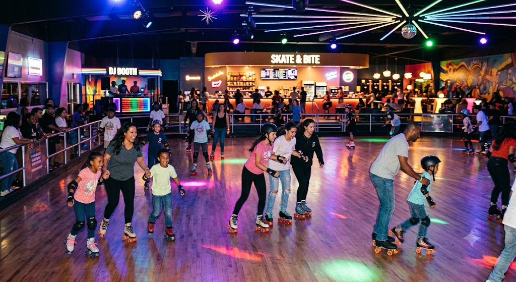 Diverse families and kids skating under colorful lights at The Skate Haus Lounge